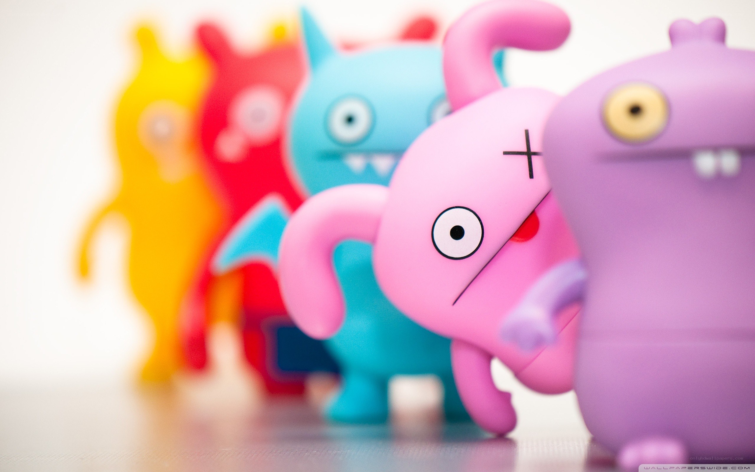 Uglydoll figures in a line