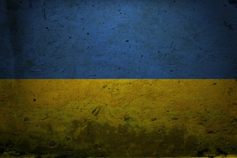 Ukrainian flag on textured wall