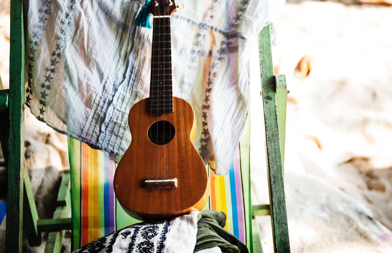 Ukulele on a beach chair