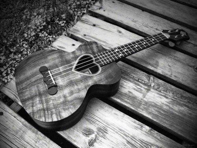Ukulele on Wooden Planks