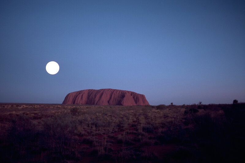 Uluru under a full moon