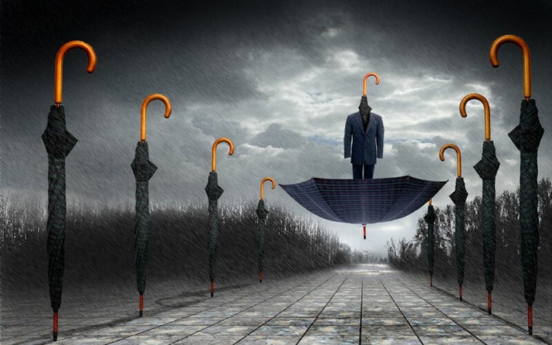 Umbrella man in storm