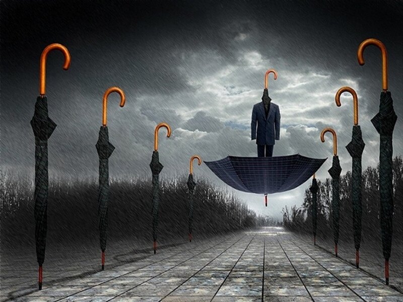 Umbrella man in storm