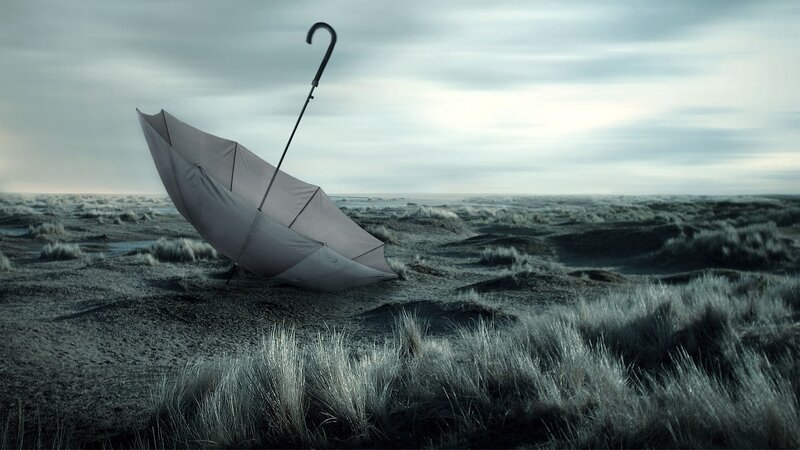 Umbrella on a desolate beach