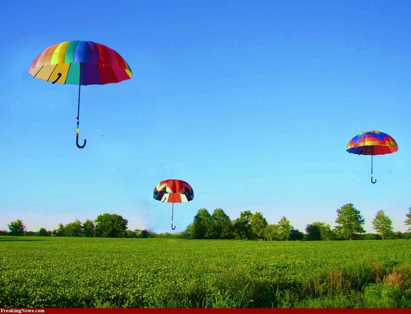 Umbrellas floating in the sky