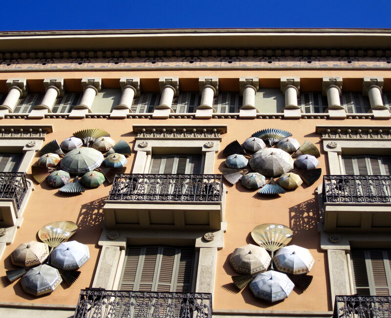 Umbrellas on Building Facade