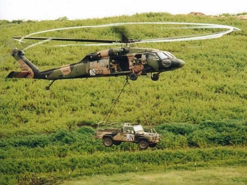 UN helicopter lifting vehicle