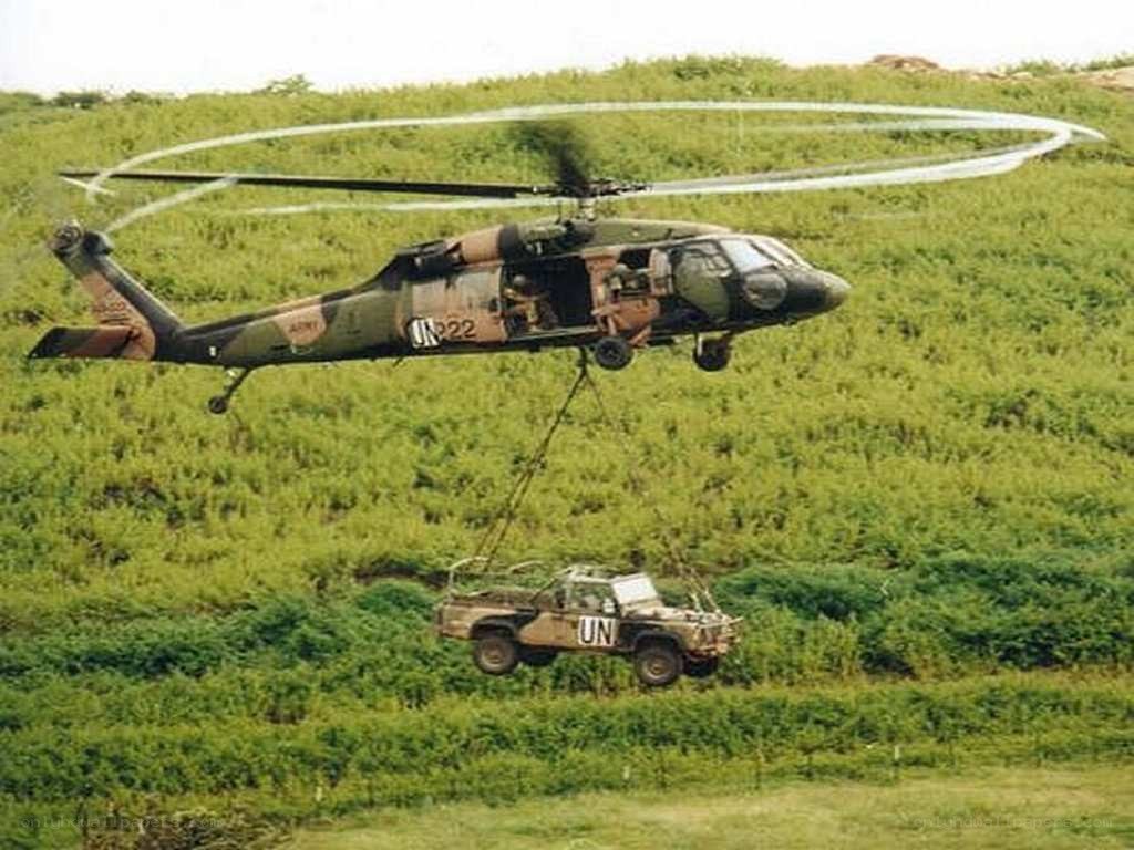 UN helicopter lifting vehicle