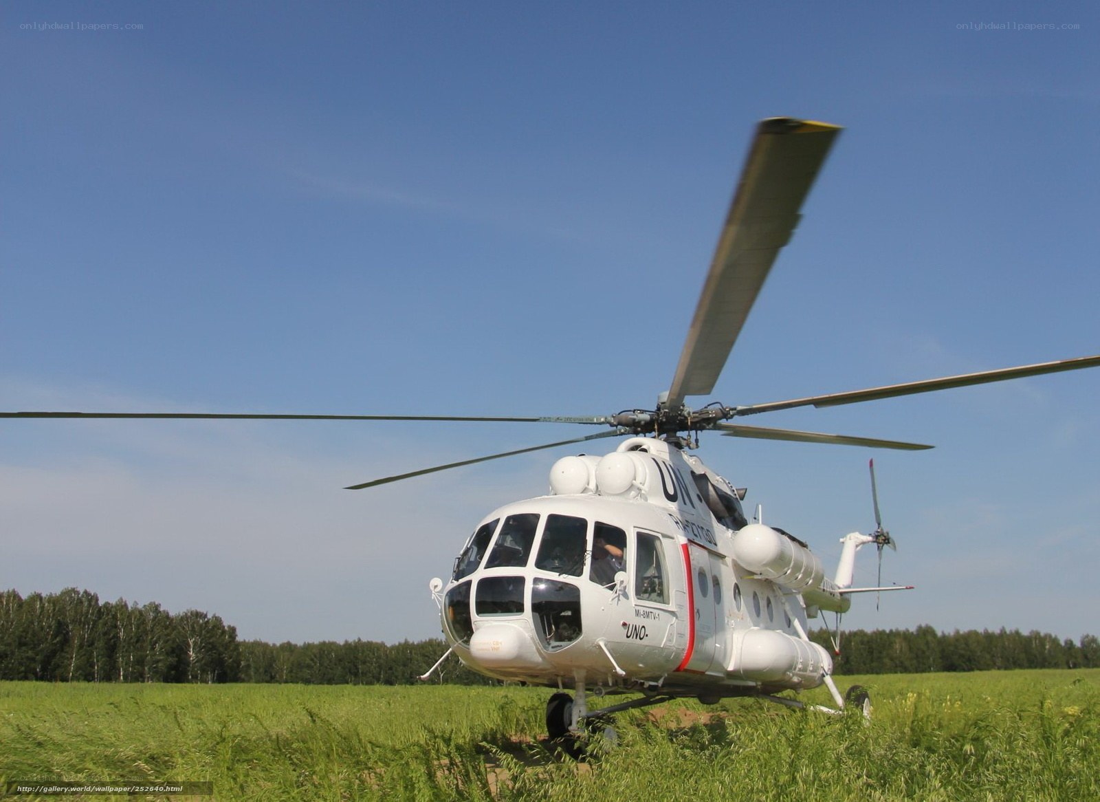 UN helicopter on grass field