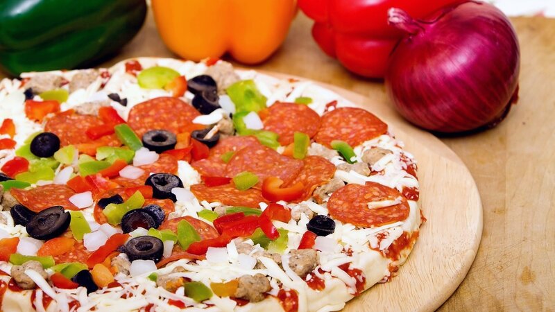 Uncooked Pizza on Board
