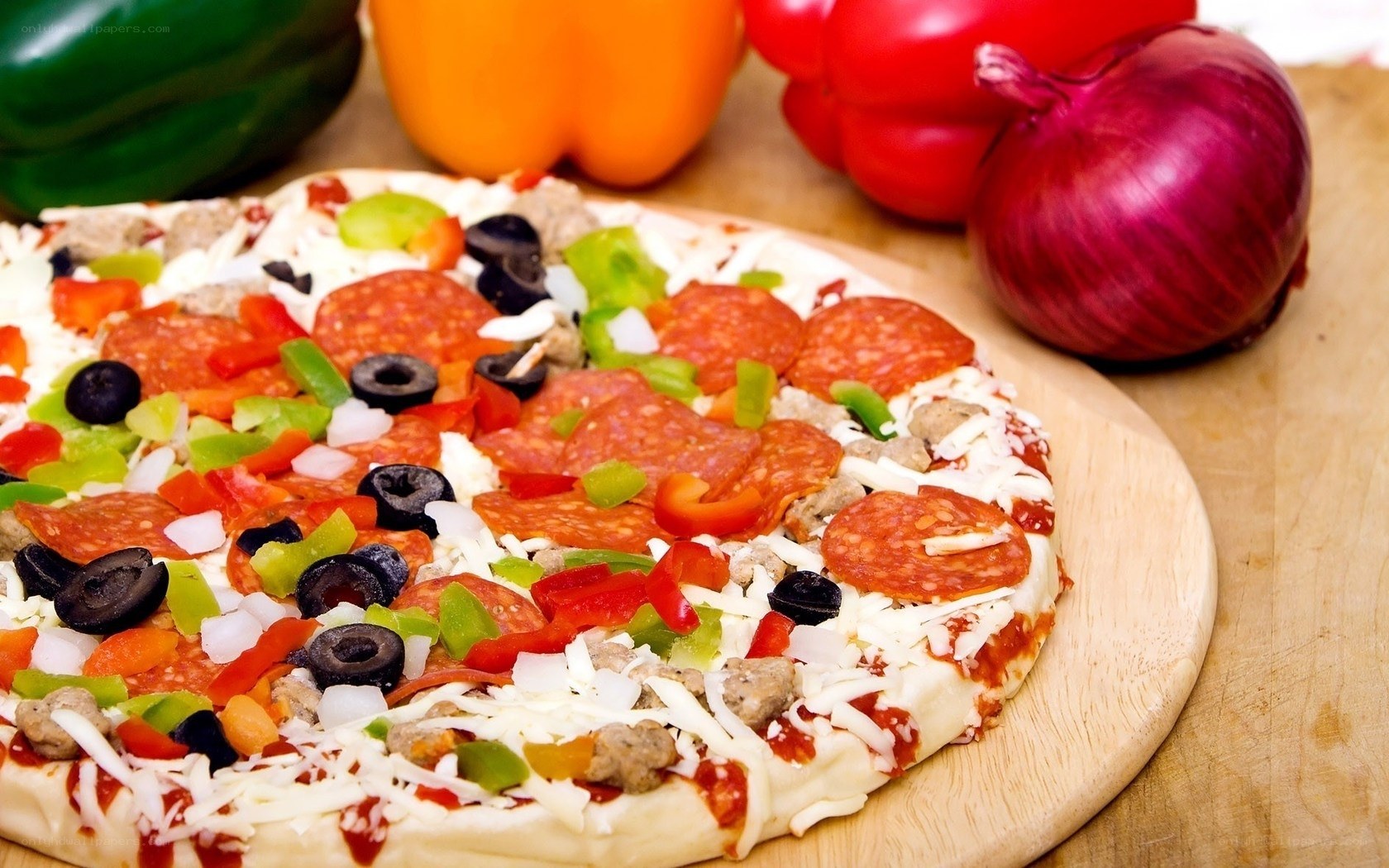 Uncooked pizza with toppings