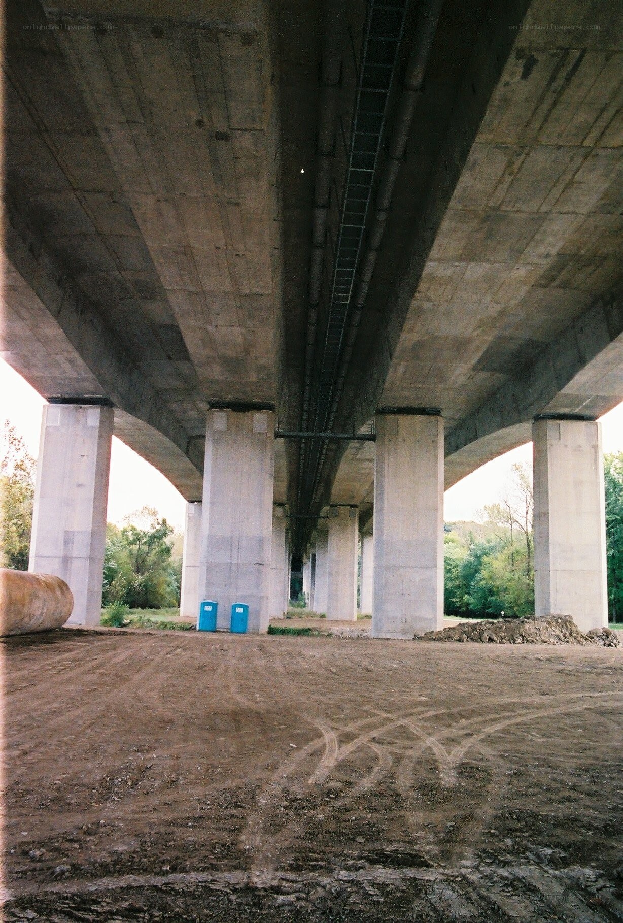 Under a concrete bridge