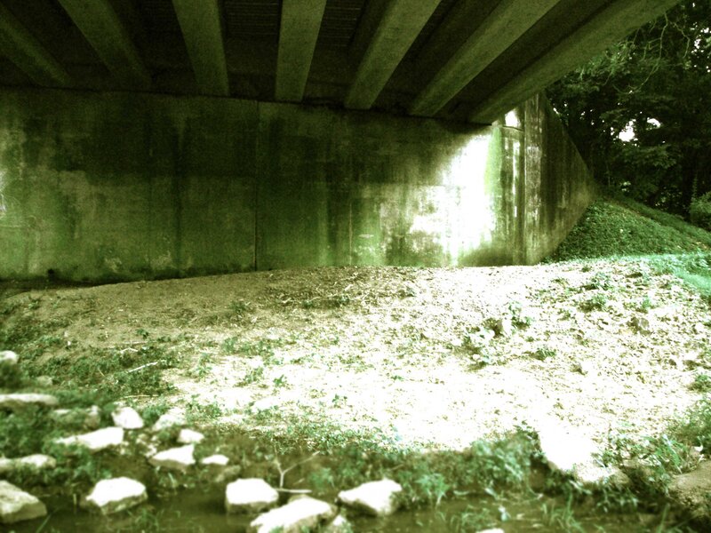 Under a concrete bridge