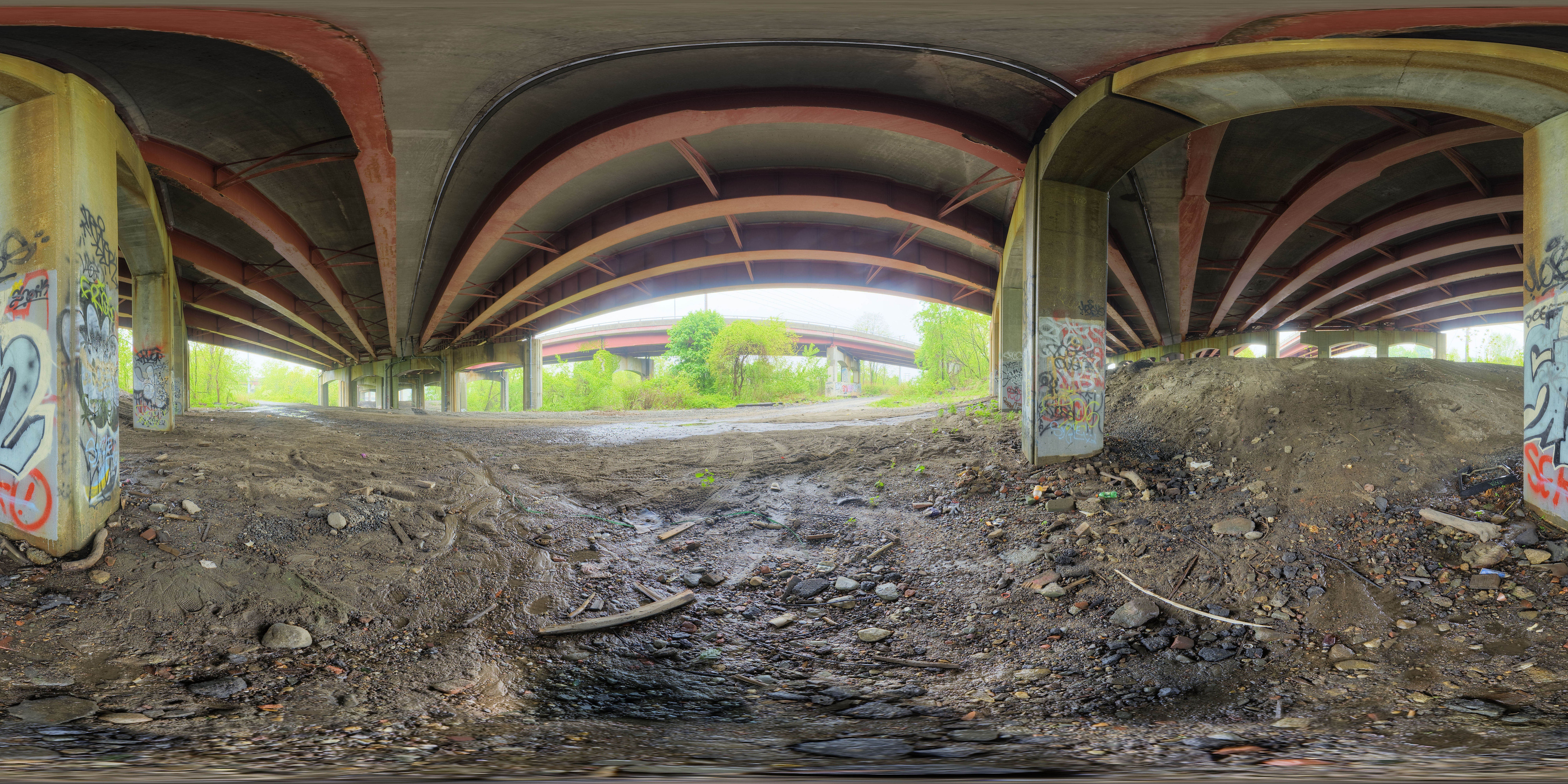 under bridge with graffiti