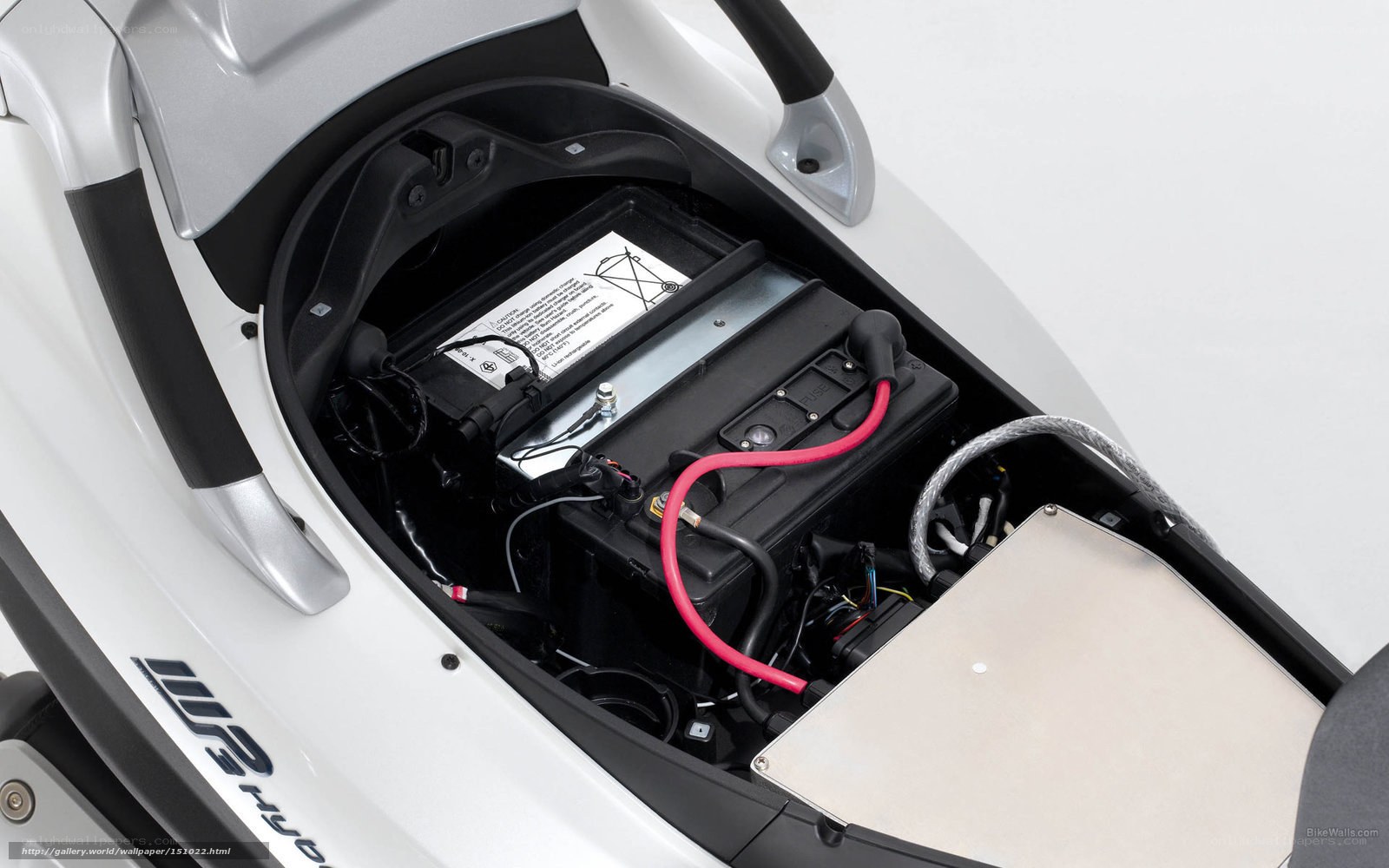 under-seat battery compartment