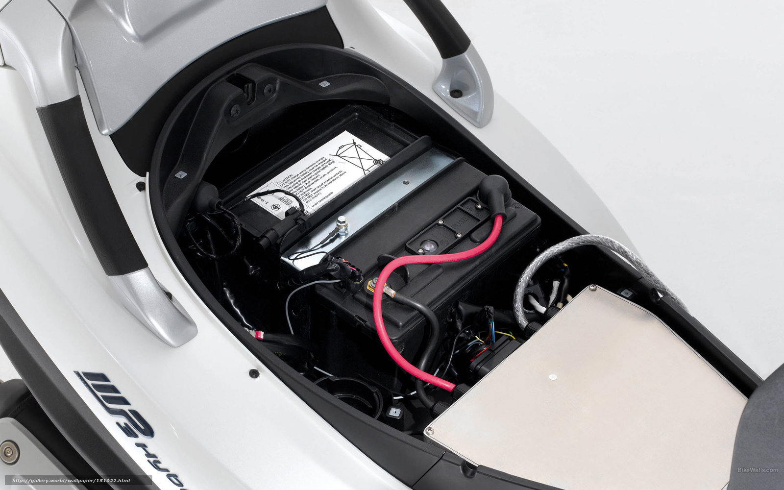 under-seat battery compartment