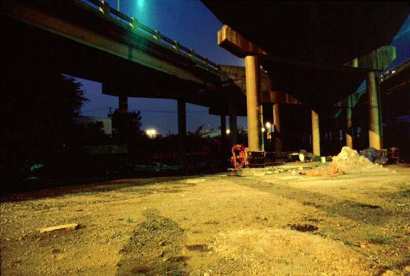 Under the highway at night