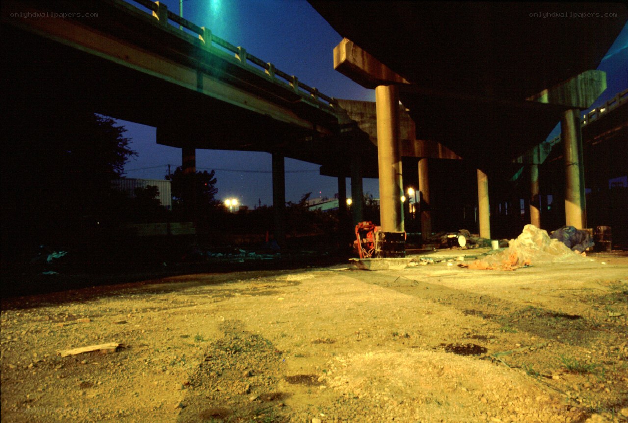 Under the highway at night