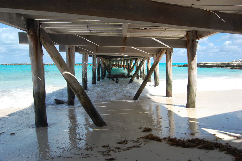 under the pier at the beach