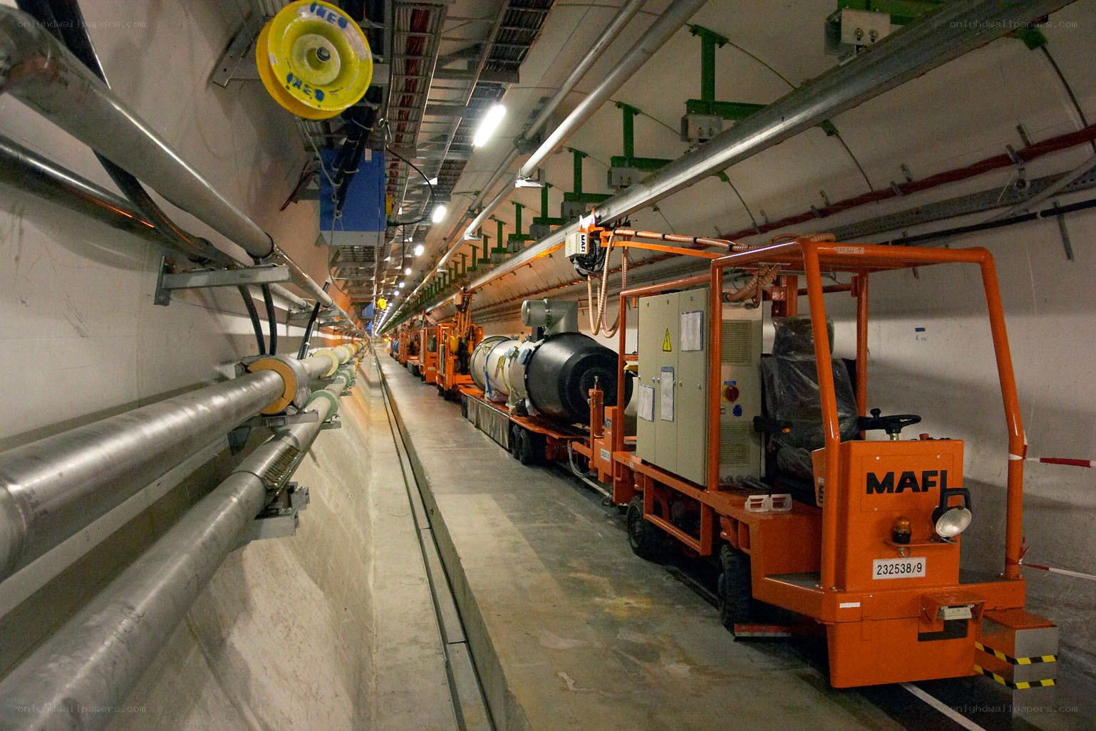 Underground tunnel with maintenance vehicles