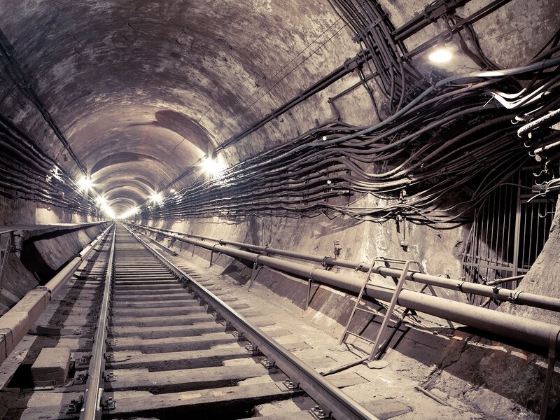 Underground tunnel with railway tracks