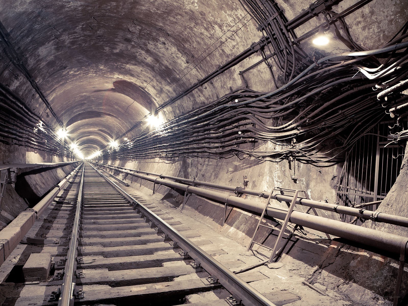 Underground tunnel with railway tracks