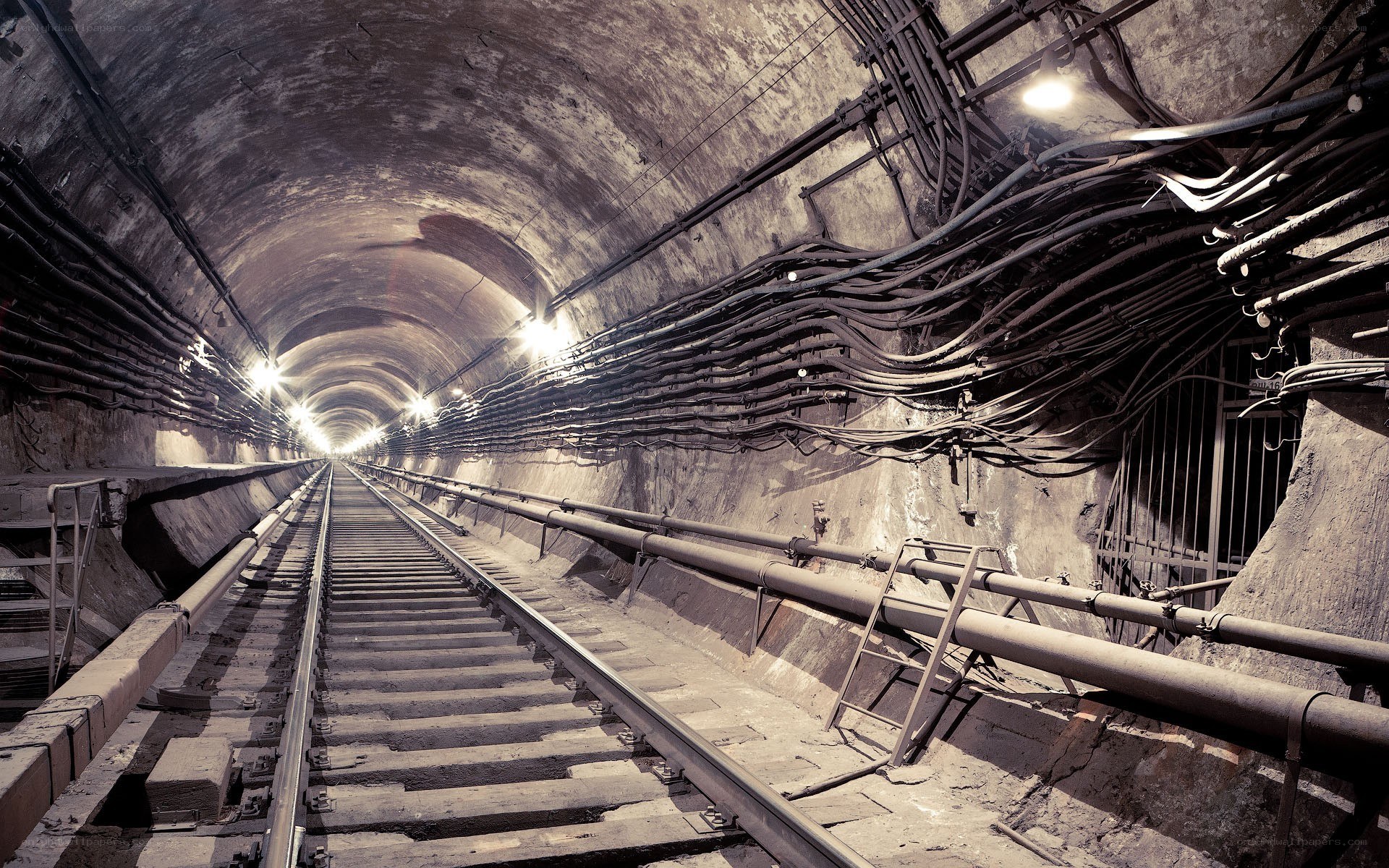 Underground tunnel with railway tracks
