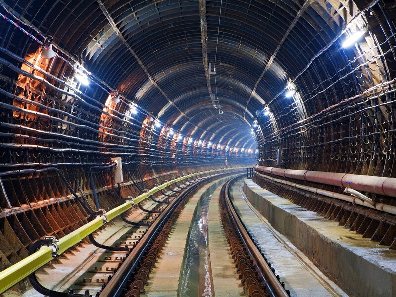 Underground tunnel with railway tracks