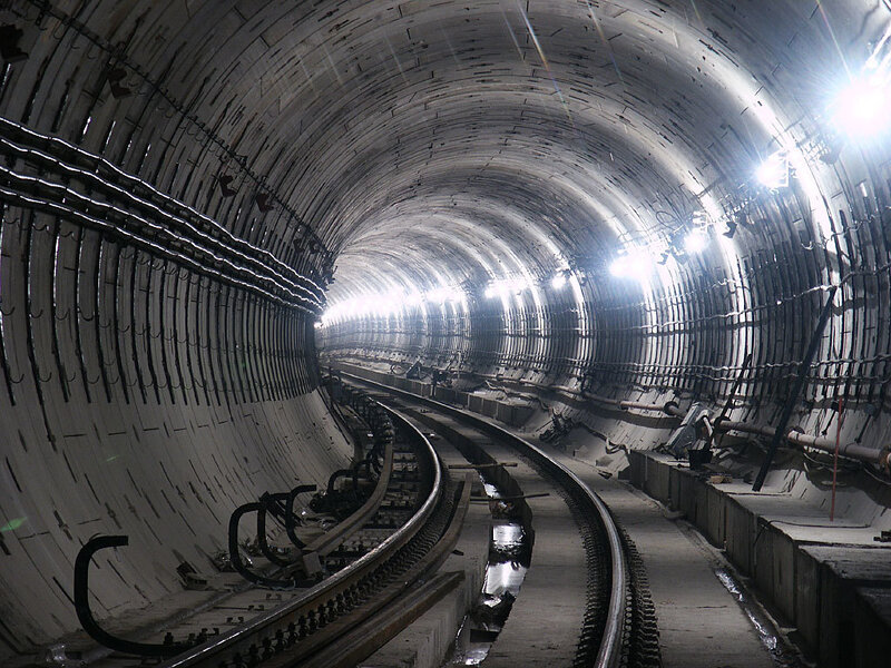 Underground tunnel with railway tracks