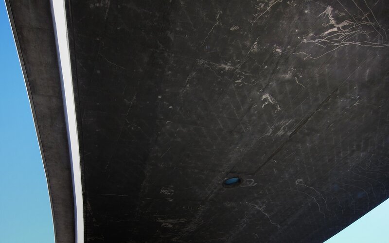 underneath a concrete structure