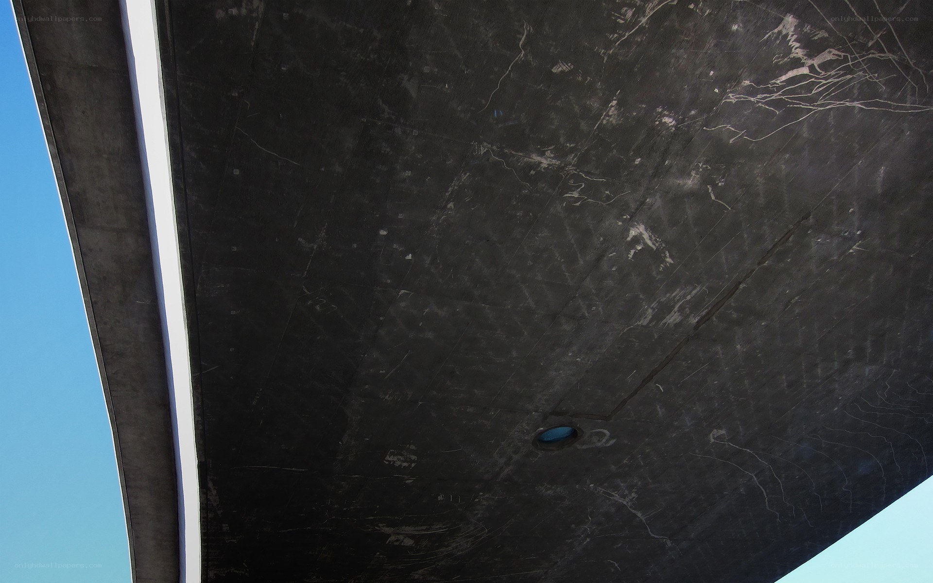 underneath a concrete structure