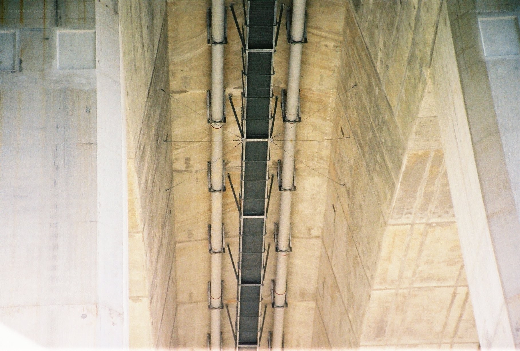 underneath a concrete structure