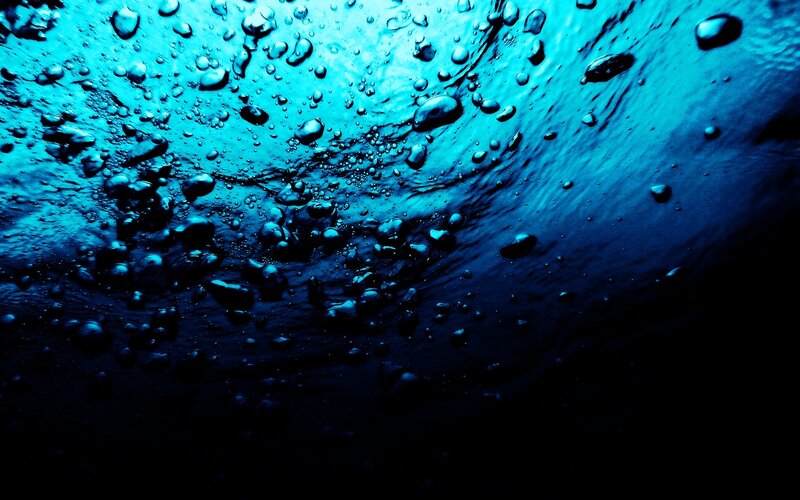 underwater bubbles and blue light