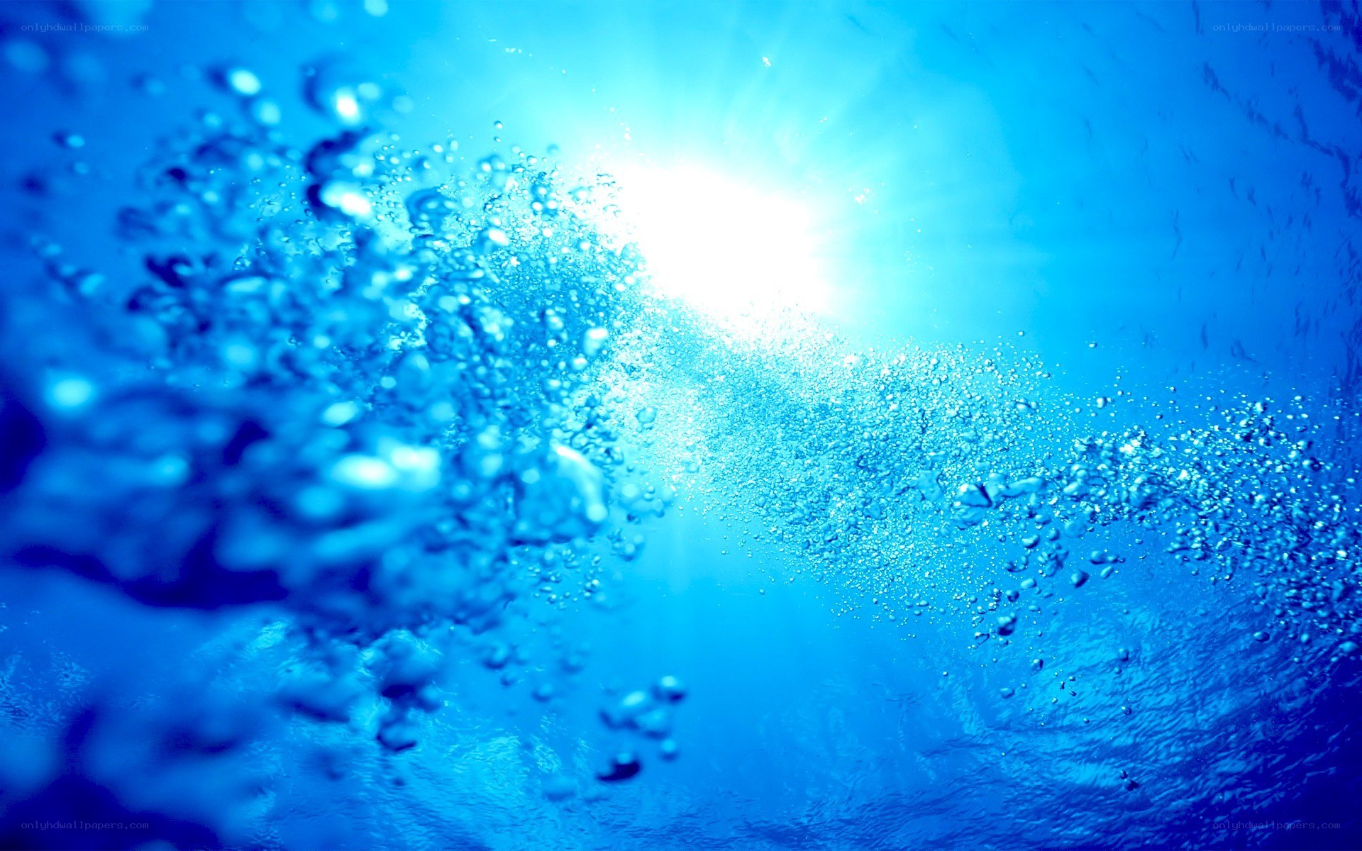underwater bubbles and sunlight