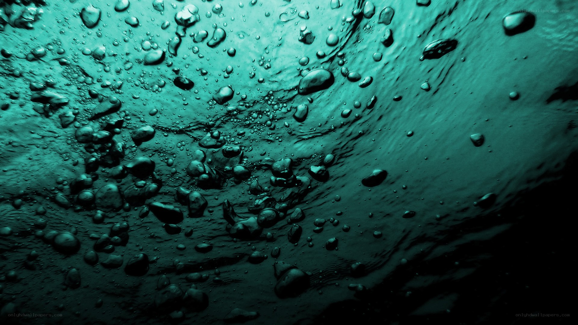 Underwater bubbles and waves