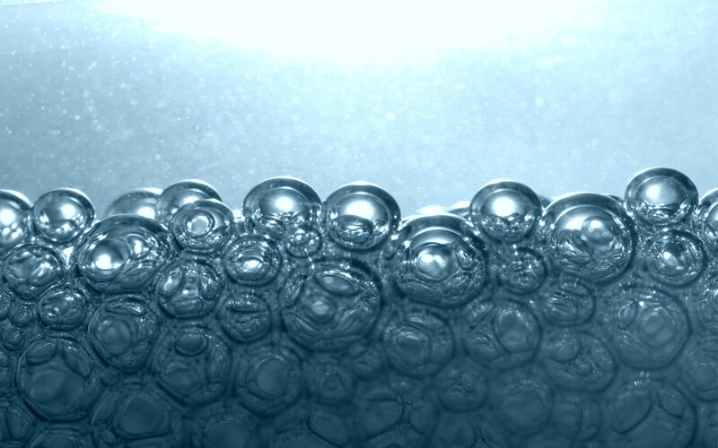Underwater bubbles in blue light
