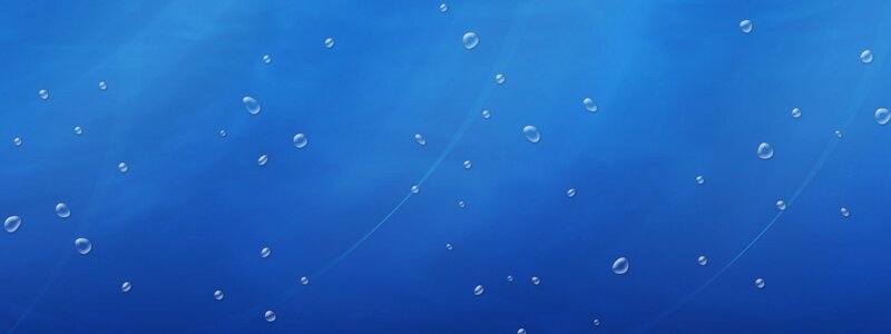 Underwater bubbles in blue water