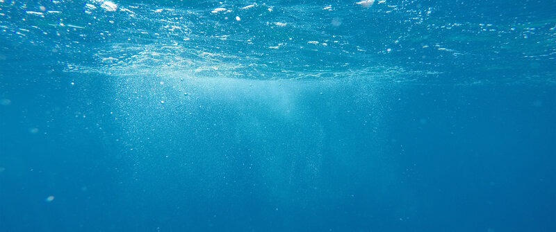 Underwater Bubbles in Blue Water — Serene