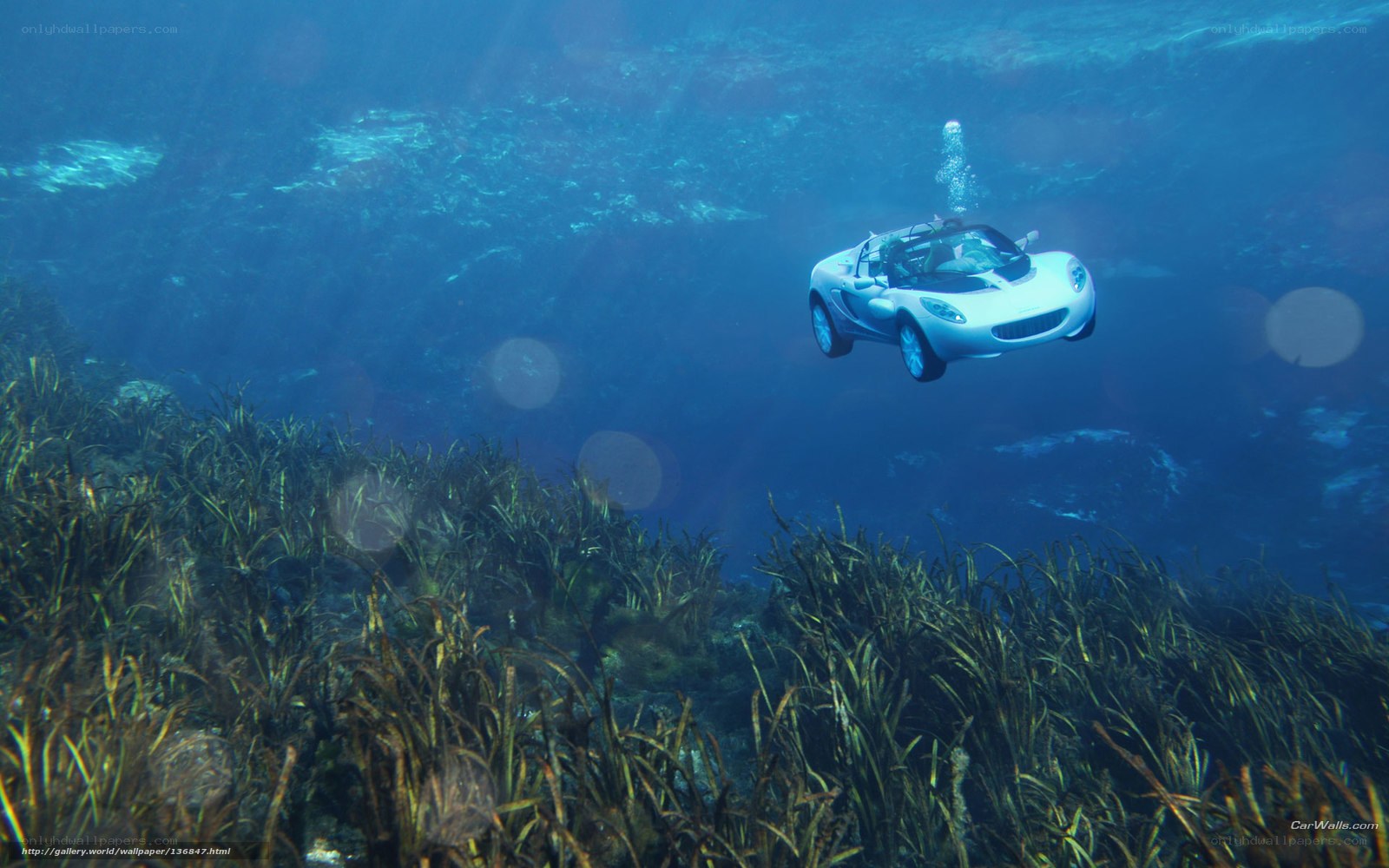 Underwater car in blue sea