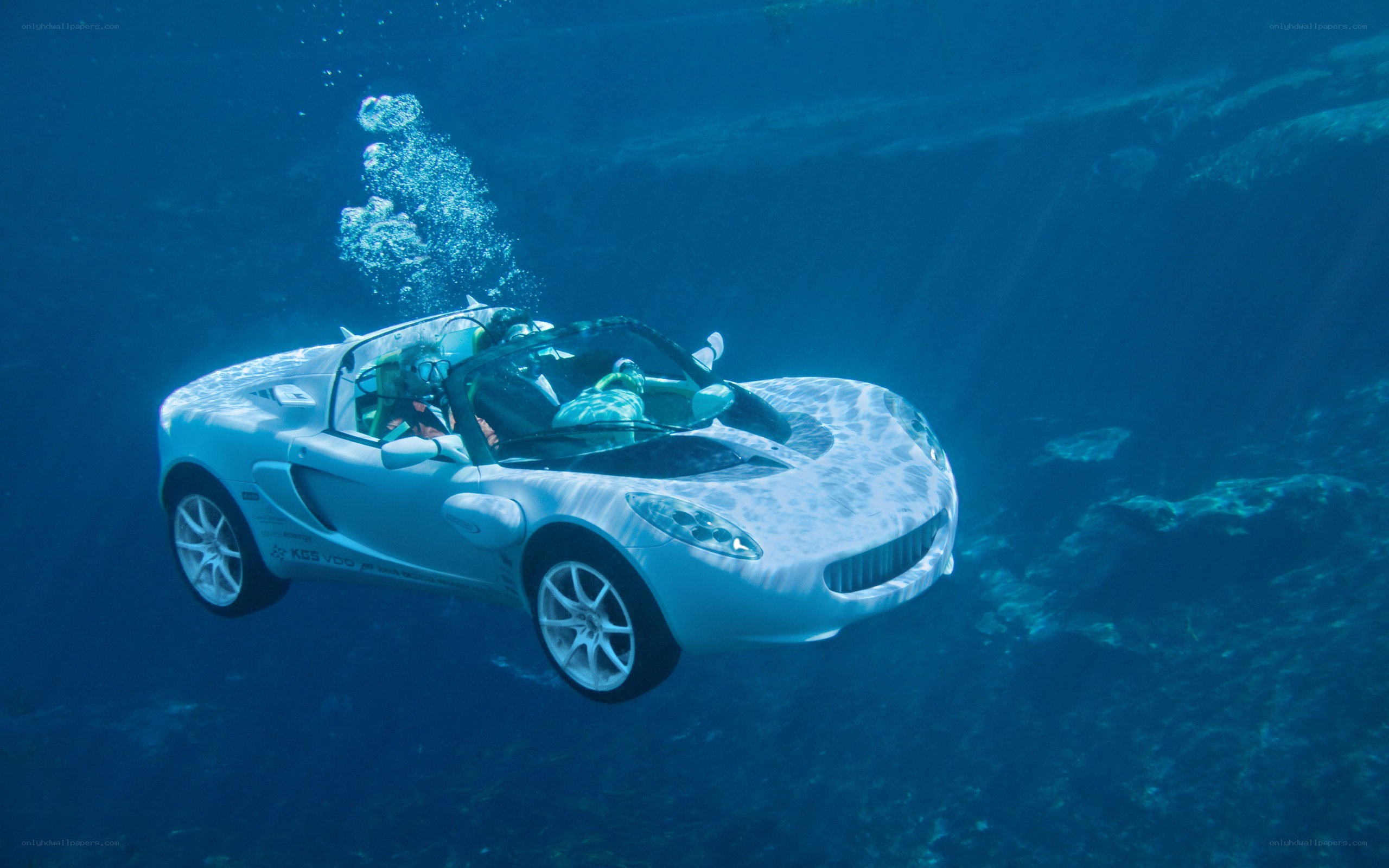 underwater car in blue water