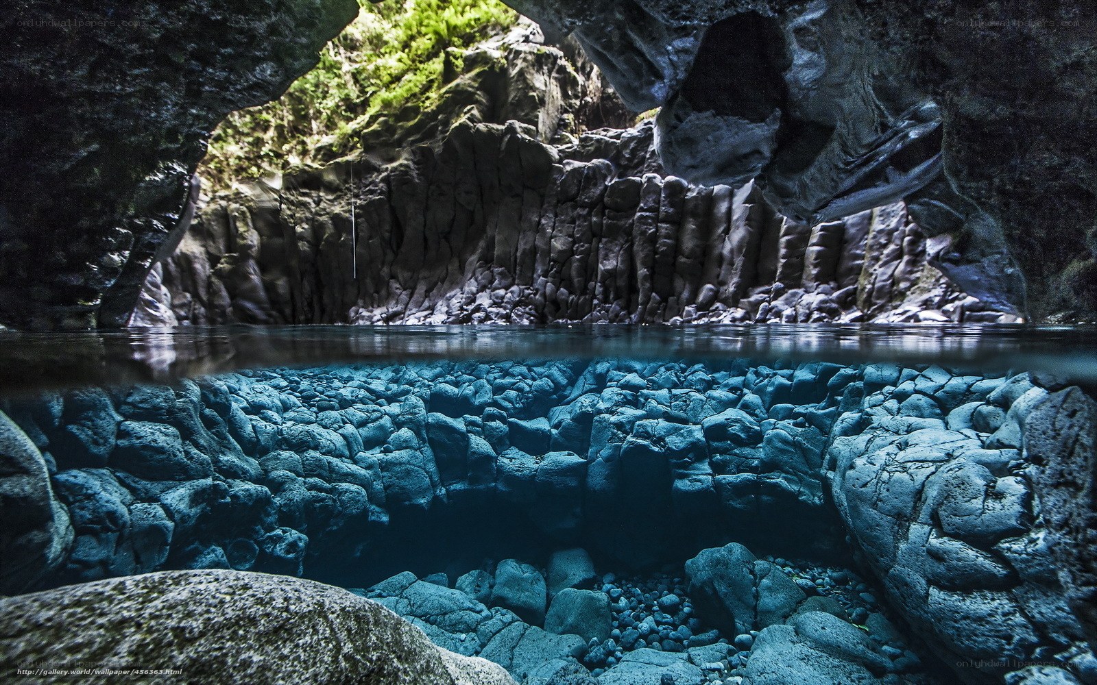 Underwater cave with blue water