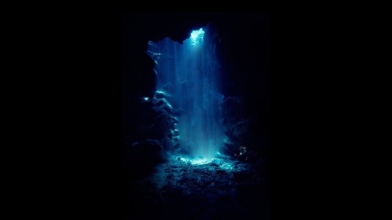 Underwater cave with light beam