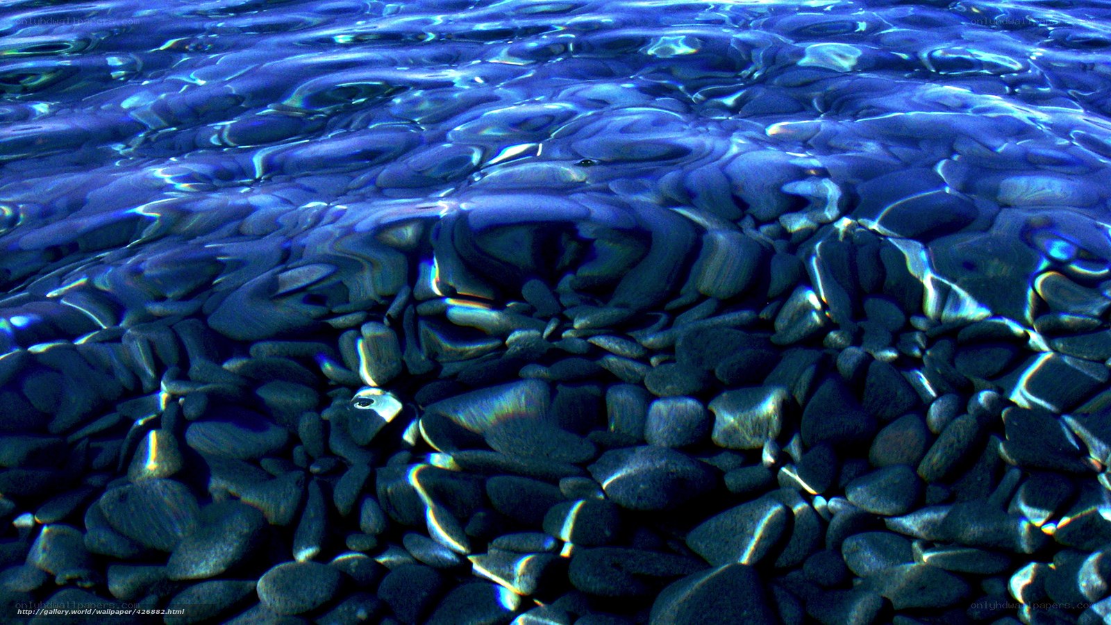Underwater pebbles in clear water