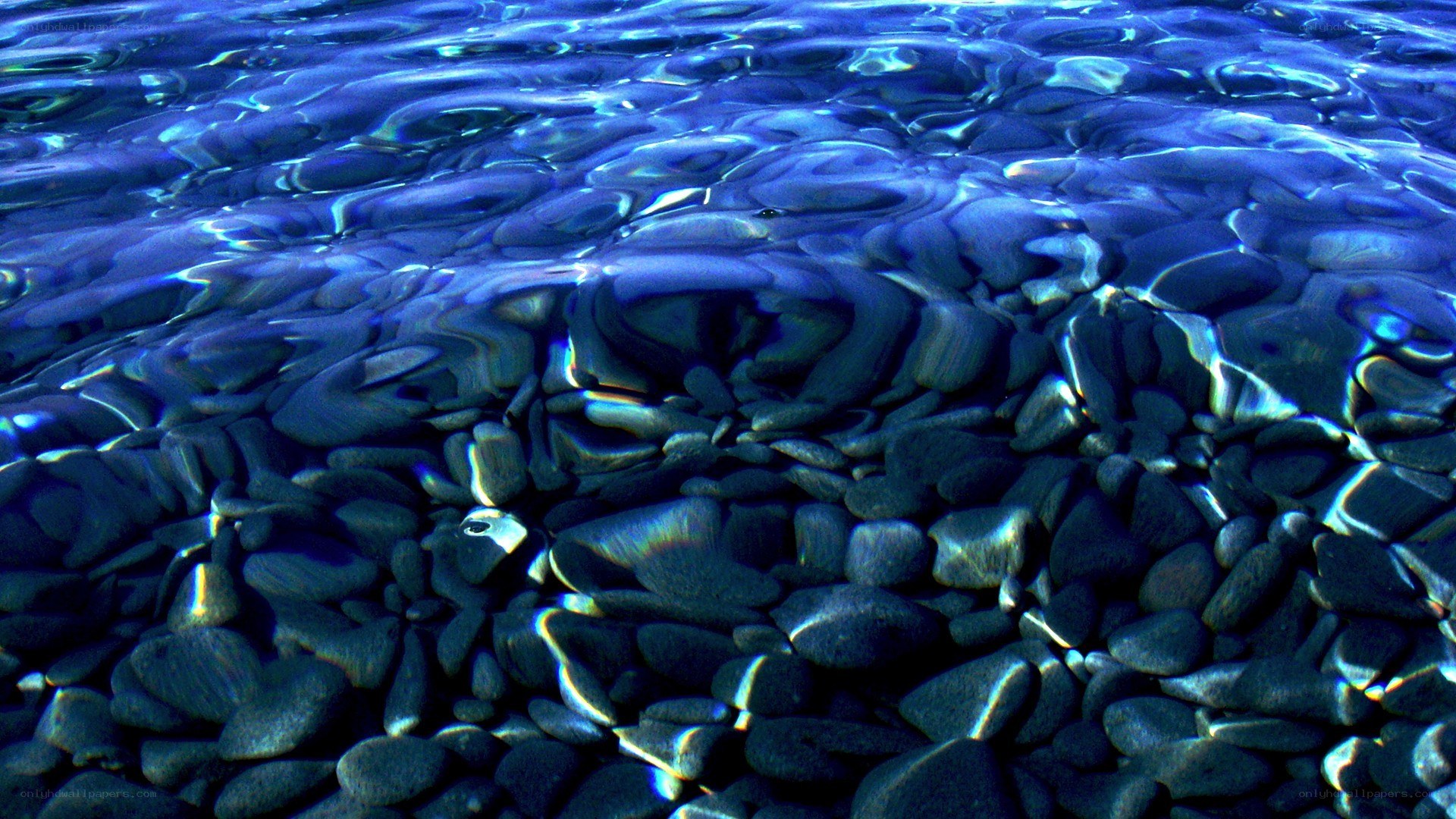 Underwater pebbles in clear water