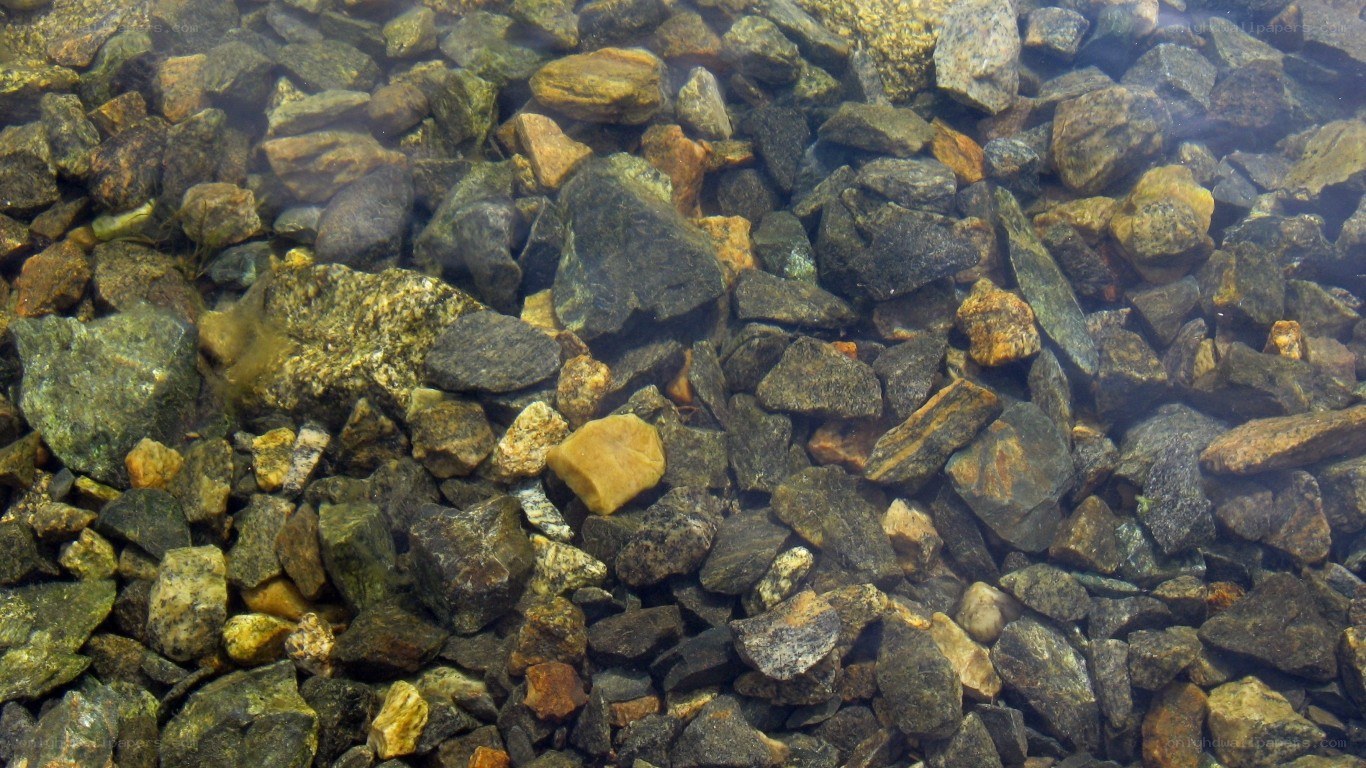underwater rocks in clear water