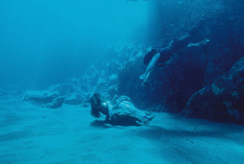 Underwater scene with two figures
