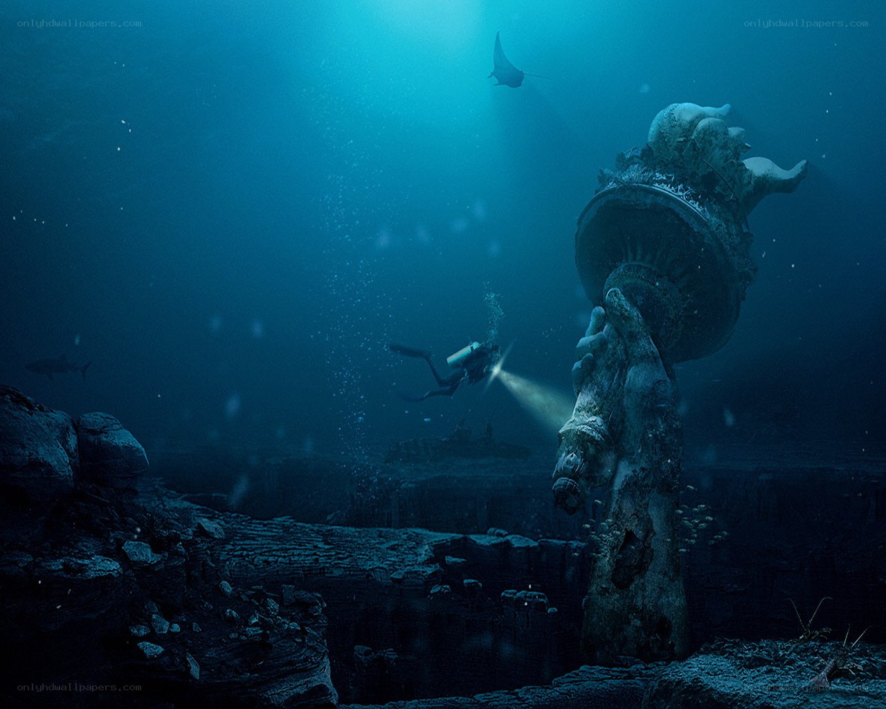 Underwater statue and diver