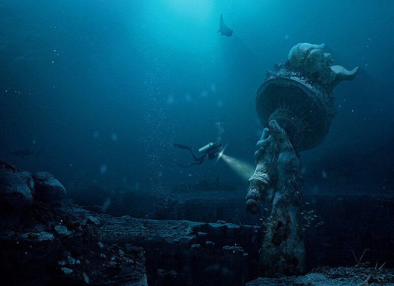 Underwater statue and diver