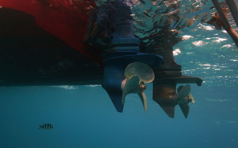 Underwater view of boat propellers