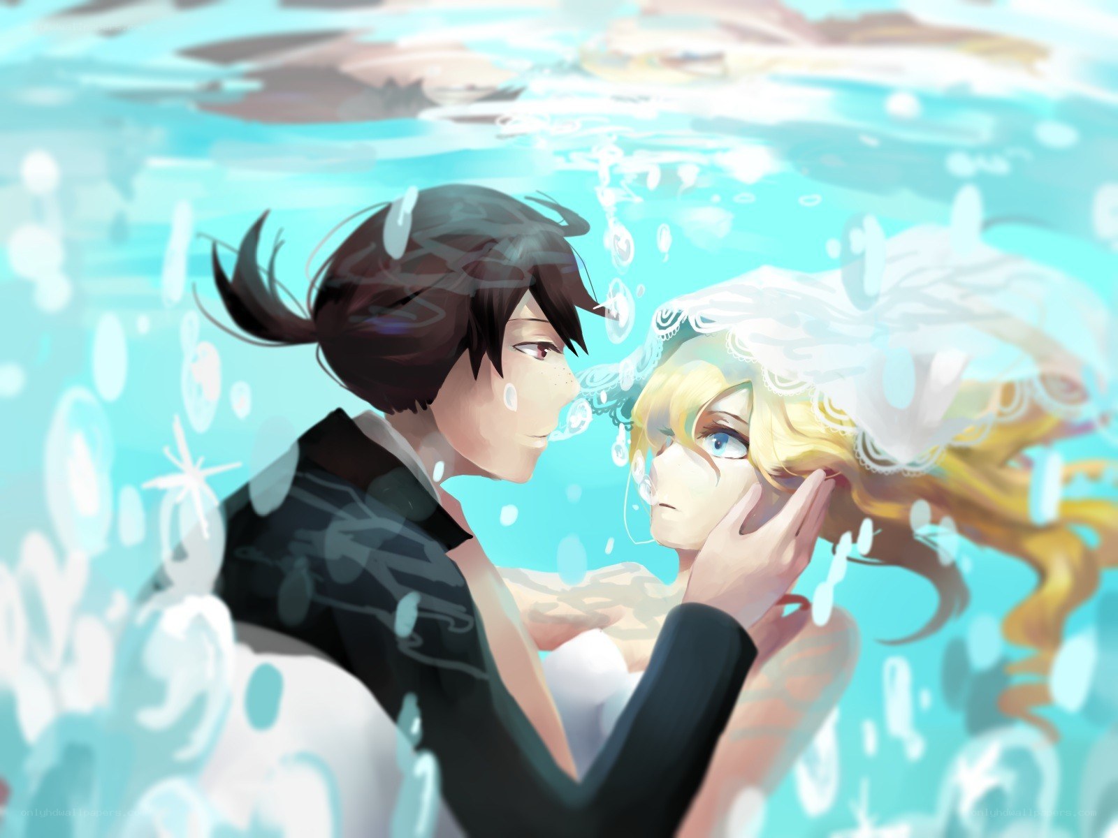 underwater wedding embrace